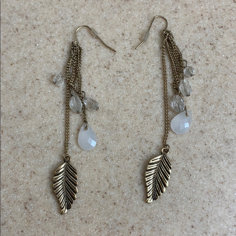 Gold feather dangle earrings
